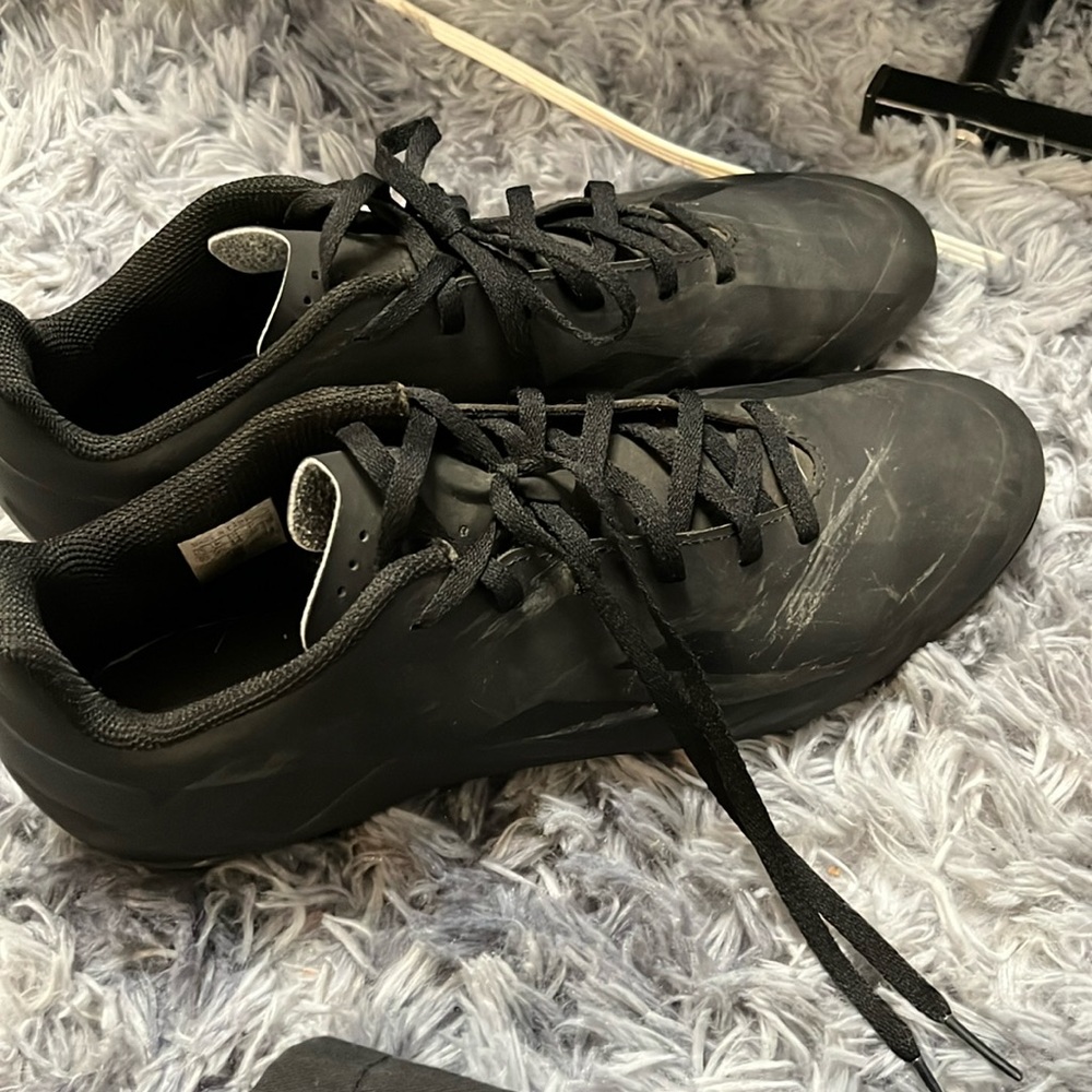 Men’s adidas black soccer cleats